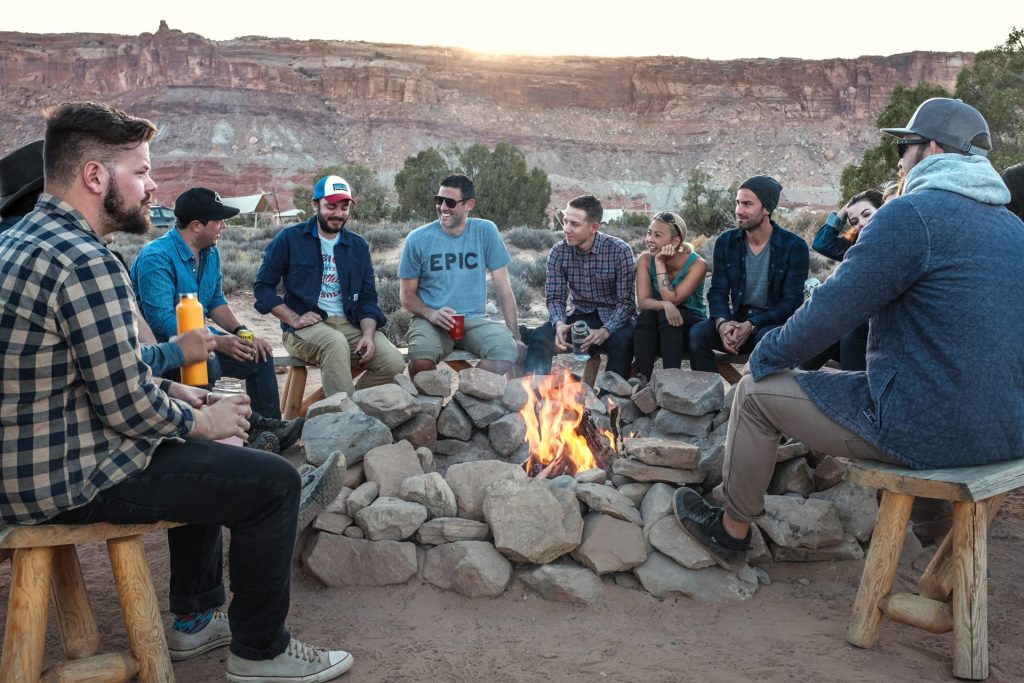 Group sitting around a campfire