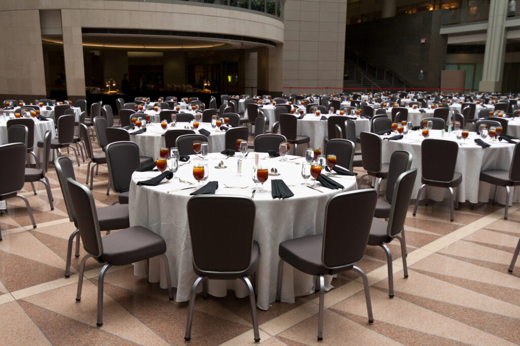 An event site set up with tables and chairs.