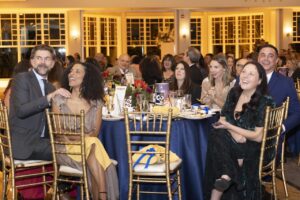 Every guest's table number landed on their phone before they'd taken off their coat. Paddle number too, for anyone planning to raise it later.